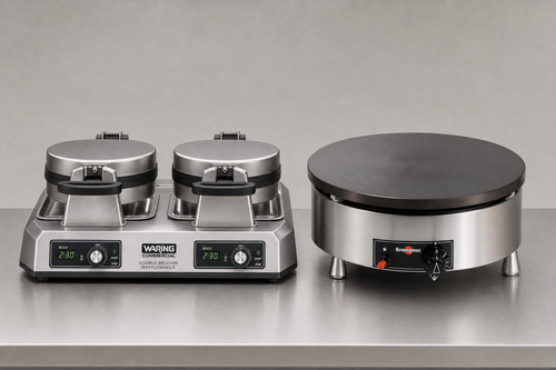 Waring WW300BX double Belgian waffle maker and Krampouz gas crepe maker on a stainless commercial counter