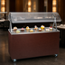 Thumbnail image #3 for Vollrath 2-Series Affordable Portable 60-Inch Open Storage Utility Station with Buffet Breath Guard and Cherry Woodgrain Finish