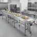 Thumbnail image #2 for Dinex DXIESSB16 16-Foot Slat Belt Motorized Tray Make-Up Conveyor
