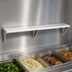 Thumbnail image #3 for Advance Tabco Triumph Supreme Stainless Steel Carving Station Shelf with Removable 3/8-Inch White Poly Cutting Board, 62-7/16 Inches x 12 Inches, For 4-Well Hot & Cold Food Units