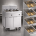Thumbnail image #3 for Imperial 4-Battery Electric Floor Fryer with 75 lb. Tanks and Built-In Space Saver Filter System