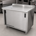 Thumbnail image #3 for Advance Tabco Enclosed Cabinet Base Work Table with Sliding Doors, Mid-Shelf, and 14-Gauge 304 Stainless Steel Top, 120 x 24 Inches