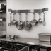 Thumbnail image #3 for Advance Tabco Wall-Mounted Stainless Steel Pot Rack with Single Bar and 9 Plated Double Hooks, 96 Inch