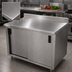 Thumbnail image #3 for Advance Tabco Special Value Series 84-Inch x 30-Inch Enclosed Work Table with Cabinet Base, Mid-Shelf, Sliding Doors, 16-Gauge 304 Stainless Steel Top, and 5-Inch Backsplash