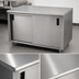 Thumbnail image #3 for Advance Tabco Special Value Series Enclosed Work Table with Cabinet Base, Mid-Shelf and Sliding Doors, 108 x 30 Inches, 16-Gauge 304 Stainless Steel Top