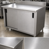 Thumbnail image #3 for Advance Tabco 60-Inch x 30-Inch Enclosed Work Table with Cabinet Base and Sliding Doors, 14-Gauge 304 Stainless Steel Top, 5-Inch Backsplash