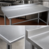 Thumbnail image #3 for Spec-Master 60-Inch W x 24-Inch D 14-Gauge Stainless Steel Work Table with Rear Upturn and Tubular Base