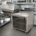 Thumbnail image #3 for Advance Tabco Open Front Cabinet Base Stainless Steel Work Table with 5-Inch Backsplash and Fixed Mid Shelf, 120 x 24 Inches