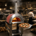 Thumbnail image #3 for Omcan Mobile Wood-Burning Pizza Oven with Brick Cooking Area, Red Enamel Shield, and Casters