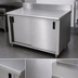 Thumbnail image #3 for Advance Tabco Special Value Series Enclosed Work Table with Cabinet Base, Sliding Doors, Mid-Shelf, 16-Gauge 304 Stainless Steel Top, and 5-Inch Backsplash, 48 x 30 Inches