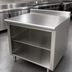 Thumbnail image #3 for Advance Tabco 84-Inch x 30-Inch 304 Stainless Steel Work Table with Open Front Cabinet Base, Mid-Shelf, and 5-Inch Backsplash