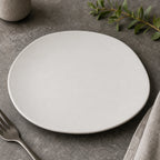 Thumbnail image #3 for CFS Brands Ridge 5310423 9-Inch Freeform Rimless Melamine Plate, Cement, Matte Finish Case of 12