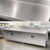 Thumbnail image #3 for Advance Tabco Special Value Economy Enclosed Work Table with Cabinet Base, Mid-Shelf, Hinged Doors, 16-Gauge 304 Stainless Steel Top, and 5-Inch Backsplash, 96 x 30 Inches