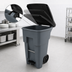 Thumbnail image #4 for BRUTE Step-On Rollout Trash Container with Hinged Lid, 65 Gallon, Gray