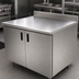 Thumbnail image #3 for Advance Tabco 36-Inch x 24-Inch Enclosed Work Table with Cabinet Base, 14-Gauge 304 Stainless Steel Top and 5-Inch Backsplash