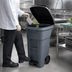 Thumbnail image #4 for Rubbermaid Commercial BRUTE 32 Gallon Step-On Rollout Trash Container with Hinged Lid