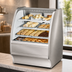 Thumbnail image #3 for True 36-1/4 Inch Curved Glass Dry Pastry Display Case with Stainless Steel Exterior and White Interior