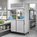 Thumbnail image #3 for True SPEC SERIES 2-Section Pass-Thru Reach-In Refrigerator with 2 Glass and 2 Stainless Steel Half Front Doors and 2 Glass Rear Doors