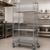 Thumbnail image #3 for Quantum Commercial Post Basket Cart with 1 Wire Shelf, 1 Solid Shelf and 5 Baskets, 1200 lb. Capacity, 48 x 24 x 80 Inches, Chrome Plated