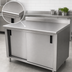 Thumbnail image #3 for Advance Tabco Enclosed Stainless Steel Work Table with Sliding Doors, Mid-Shelf and 1-1/2 Inch Rear Up-Turn, 144 x 24 Inches