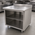 Thumbnail image #3 for Advance Tabco 84-Inch x 24-Inch 14-Gauge 304 Stainless Steel Work Table with Open Front Cabinet Base, Mid-Shelf, and 5-Inch Backsplash