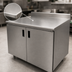 Thumbnail image #3 for Advance Tabco Special Value Economy Enclosed Work Table with Cabinet Base, Mid-Shelf, Hinged Doors, 72 x 24 Inches, 16-Gauge 304 Stainless Steel Top