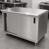 Thumbnail image #3 for Advance Tabco CB-SS-366 Enclosed Work Table with Cabinet Base and Sliding Doors, 72W x 36D, 14-Gauge 304 Stainless Steel Top