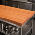 Thumbnail image #3 for Boos Block 72 Inch x 42 Inch American Cherry Edge Grain Kitchen Countertop with Full-Length Rails, 2-1/4 Inch Thick, Varnique Finish