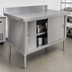 Thumbnail image #3 for Omcan 48 Inch x 30 Inch Enclosed Work Table with Sliding Doors, 18-Gauge Stainless Steel Top, and 4 Inch Backsplash