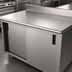 Thumbnail image #3 for Advance Tabco CK-SS-248M Enclosed Stainless Steel Work Table with Cabinet Base, Sliding Doors, and 5-Inch Backsplash, 96 x 24 Inch