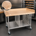 Thumbnail image #3 for John Boos BAK04 48 Inch x 36 Inch Wood Top Bakery Prep Table with Stainless Steel Base, Undershelf, Bun Pan Rack, and Locking Casters