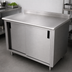 Thumbnail image #3 for Advance Tabco CF-SS-244M 48 Inch x 24 Inch Stainless Steel Enclosed Work Table with Cabinet Base, Sliding Doors and Mid-Shelf