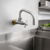 Thumbnail image #3 for T&S Brass Big-Flo Wall-Mount Faucet with 6-1/2 Inch Swing Nozzle and 4-Arm Handle