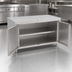 Thumbnail image #3 for John Boos 36 Inch x 24 Inch Enclosed Stainless Steel Flat-Top Work Table with Cabinet Base and Hinged Doors