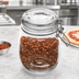 Thumbnail image #3 for 26 oz. Clear Glass Mason Jar Condiment Jar with Hinged Lid