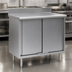 Thumbnail image #3 for Eagle Group Spec-Master 60-Inch W x 24-Inch D Stainless Steel Enclosed Work Table with Sliding Doors and 4-1/2-Inch Backsplash