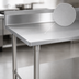 Thumbnail image #3 for John Boos Stallion 120-Inch x 30-Inch 14-Gauge Stainless Steel Work Table with 5-Inch Backsplash, Galvanized Base, and Adjustable Undershelf
