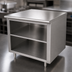 Thumbnail image #3 for Advance Tabco 36 Inches x 36 Inches Underbar Work Table with Open Front Cabinet Base, Mid-Shelf, and 14-Gauge 304 Stainless Steel Top