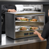 Thumbnail image #3 for BKI 2TSM-2624L Countertop Pass-Through Sandwich Warmer with Two Slanted Shelves, Left Cord