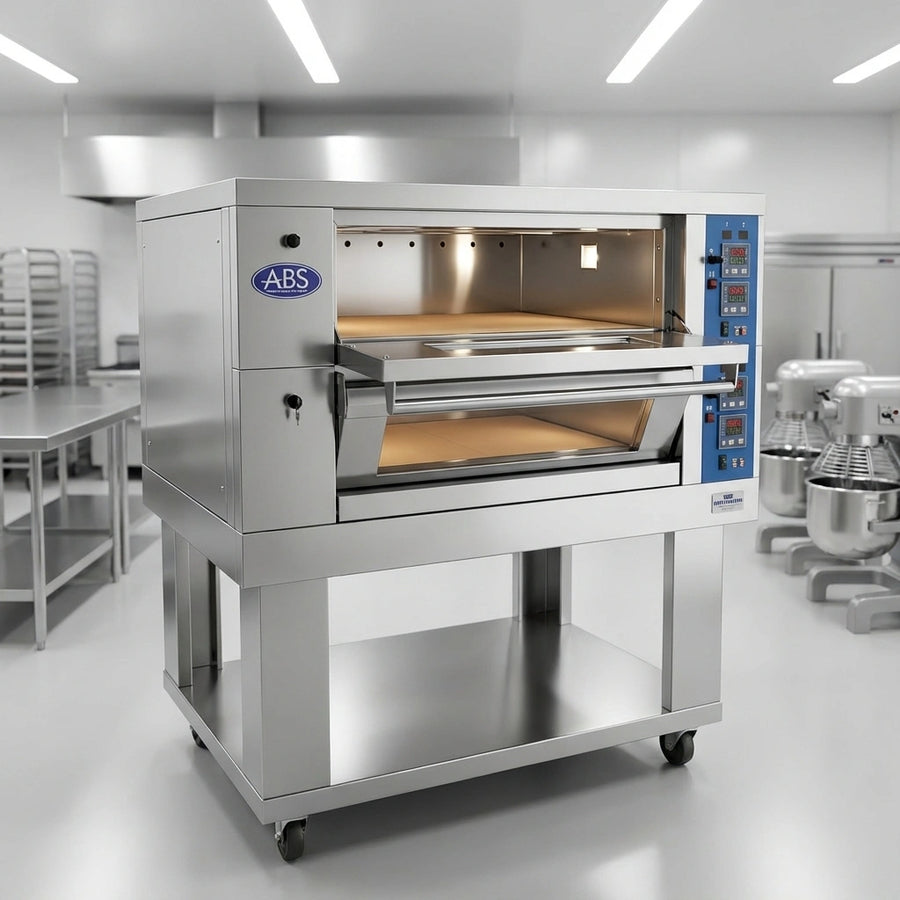 Showcasing the ABSEDO-282 Two-Deck Electric Deck Oven, its robust stainless steel construction ensures durability and effortless cleaning for any bustling bakery.
