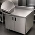Thumbnail image #3 for Advance Tabco Special Value Series Economy Enclosed Work Table with Sliding Doors, 84 x 24 Inches, 16-Gauge 304 Stainless Steel Top, 5-Inch Backsplash