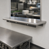 Thumbnail image #3 for Advance Tabco 72-Inch x 18-Inch 18/430 Stainless Steel Pass-Thru Shelf with Bull Nose Front and Rear