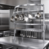 Thumbnail image #3 for Advance Tabco 96-Inch Table-Mounted Semi-Circular Stainless Steel Pot Rack with 18 Hooks and Utensil Rack