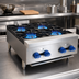 Thumbnail image #3 for Comstock-Castle Castle Series 24-Inch Countertop Gas Hotplate with 4 Star Burners, Stainless Steel