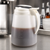Thumbnail image #3 for Vollrath Dripcut® 48 oz White Polyethylene Syrup Server with Graduated Markings and Plastic Top