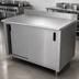 Thumbnail image #3 for Advance Tabco CK-SS-366 Enclosed Work Table with Cabinet Base and Sliding Doors, 72 x 36 Inches, 14-Gauge 304 Stainless Steel Top, 5-Inch Backsplash