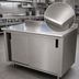 Thumbnail image #3 for Advance Tabco 96-Inch x 36-Inch Enclosed Work Table with Cabinet Base, Mid-Shelf, Sliding Doors, and 14-Gauge 304 Stainless Steel Top
