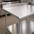 Thumbnail image #3 for Eagle Budget Series 72-Inch x 30-Inch 430 Stainless Steel Work Table with 4-1/2-Inch Backsplash and Adjustable Undershelf