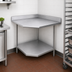 Thumbnail image #3 for Advance Tabco 30 x 30 Inch Corner Work Table with 16-Gauge 430 Stainless Steel Top, 5-Inch Backsplash, and Adjustable Undershelf