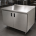 Thumbnail image #3 for Advance Tabco 60-Inch x 30-Inch Enclosed Work Table with Cabinet Base, Mid-Shelf, Hinged Doors, and 14-Gauge 304 Stainless Steel Top